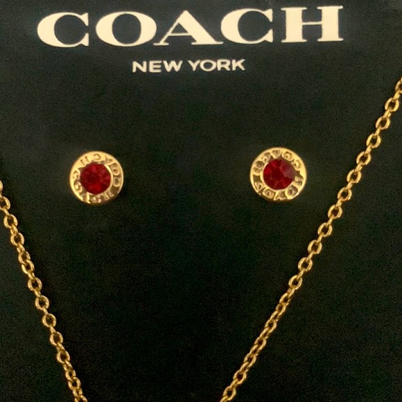 NEW gold and ruby Coach necklace and matching earrings brand new in box. - Picture 2 of 3